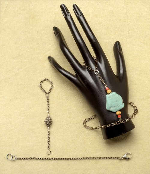 Nancy Chase's Hand Chain Bracelet - Assembling the Bracelet, Contemporary Wire Jewelry, Wire Wrapping, Wrapping, Wire Wrapping Jewelry, Be careful to place the center chain in between the ring chain ends.